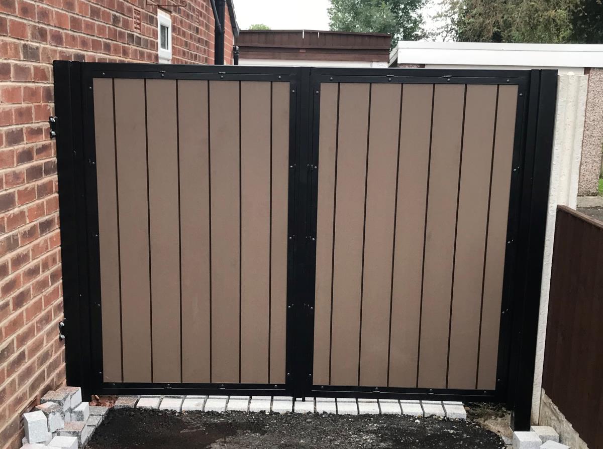 Composite infill gate in powder coated steel frame for a home in Preston, Lancashire.