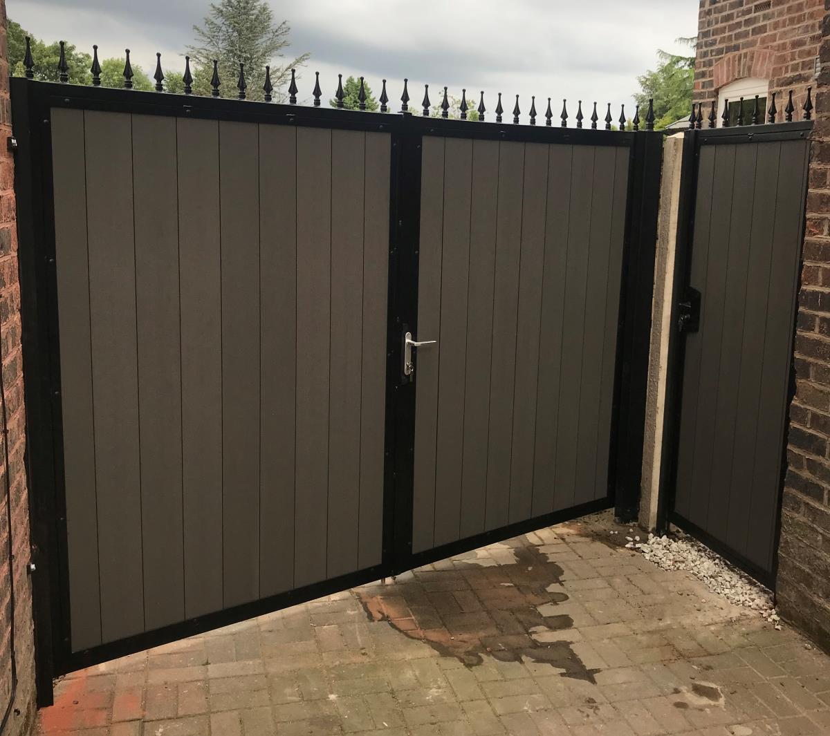 Grey composite infill gates and side gate fitted in the Greater Manchester area.