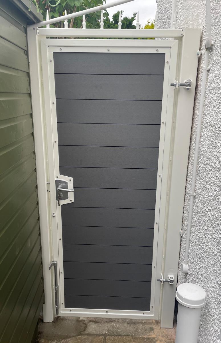 Composite gate installed in West Kirby with integral handles, locking mechanism and slide bolt.