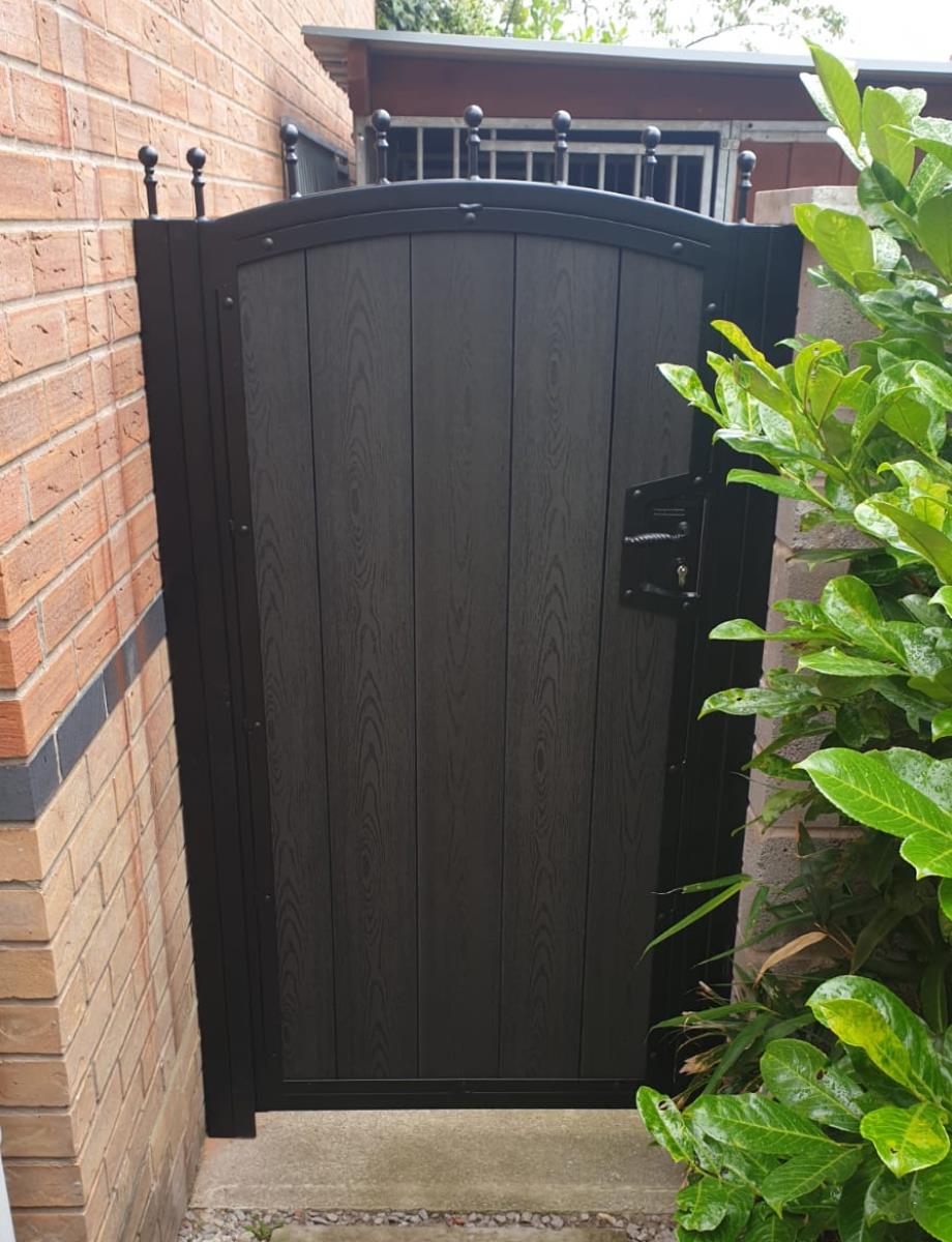 Timber style composite infill gate installed for a property in the Macclesfield area.