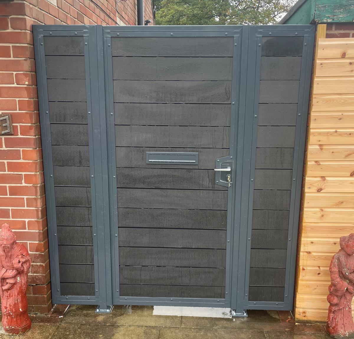Anthracite grey framed gates with charcoal black composite infill fitted in the Preston area.